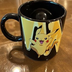 Official Pokemon Mug 16.9 is Black Ceramic Cup  w/ Pokeball Spinner - Pikachu